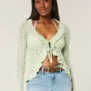 Strickjacke mit Rüschen und Bindeband vorne Strickjacke mit Rüschen und Bindeband vorne