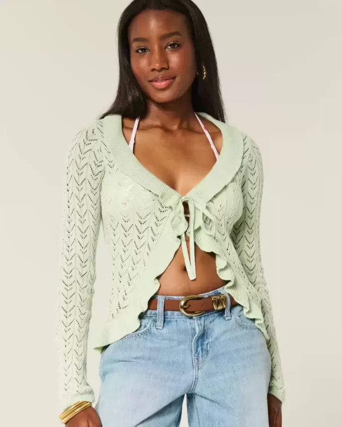 Strickjacke mit Rüschen und Bindeband vorne Strickjacke mit Rüschen und Bindeband vorne