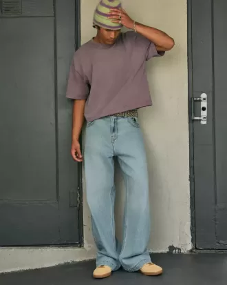 Super Baggy-Jeans mit Astronauten-Grafik in heller Waschung Super Baggy-Jeans mit Astronauten-Grafik in heller Waschung