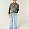 Super Baggy-Jeans mit Astronauten-Grafik in heller Waschung Super Baggy-Jeans mit Astronauten-Grafik in heller Waschung