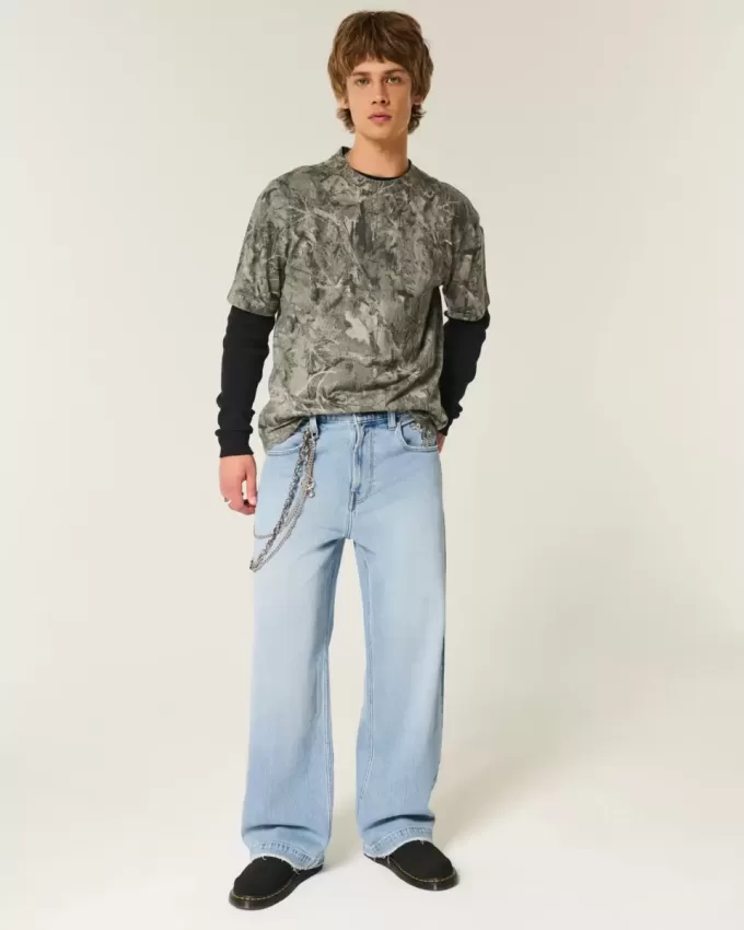 Super Baggy-Jeans mit Astronauten-Grafik in heller Waschung Super Baggy-Jeans mit Astronauten-Grafik in heller Waschung