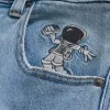 Super Baggy-Jeans mit Astronauten-Grafik in heller Waschung Super Baggy-Jeans mit Astronauten-Grafik in heller Waschung