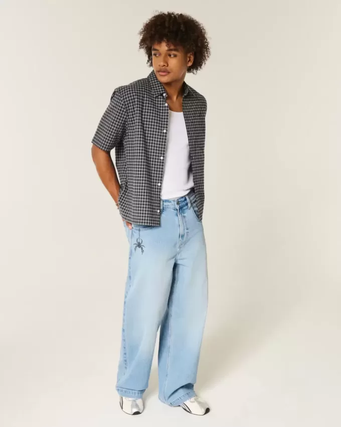 Super Baggy-Jeans mit Spider-Grafik in heller Waschung Super Baggy-Jeans mit Spider-Grafik in heller Waschung