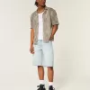 Super Baggy-Jeansshorts mit Würfelgrafik in heller Waschung Super Baggy-Jeansshorts mit Würfelgrafik in heller Waschung
