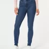 Superenge Jeans mit hoher Taille und dunkler Waschung Superenge Jeans mit hoher Taille und dunkler Waschung