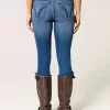 Superenge Jeans mit hoher Taille und dunkler Waschung Superenge Jeans mit hoher Taille und dunkler Waschung