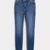 Superenge Jeans mit hoher Taille und dunkler Waschung Superenge Jeans mit hoher Taille und dunkler Waschung