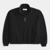 Sweatshirt mit rechteckiger Passform und Viertelreißverschluss Sweatshirt mit rechteckiger Passform und Viertelreißverschluss
