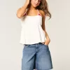Tief sitzende Baggy-Jeans mit dunkel verwaschener amerikanischer Flaggengrafik Tief sitzende Baggy-Jeans mit dunkel verwaschener amerikanischer Flaggengrafik