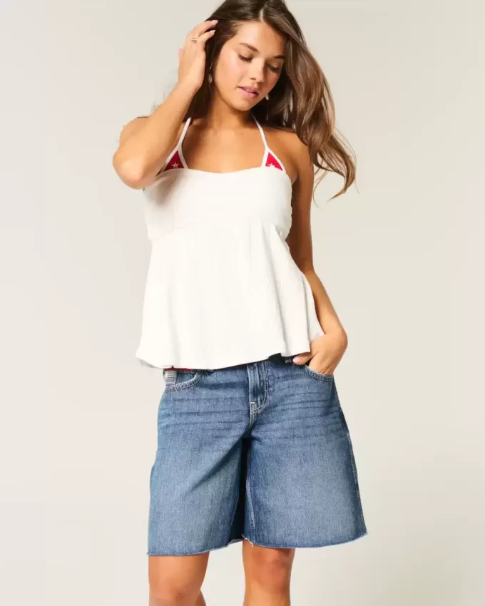 Tief sitzende Baggy-Jeans mit dunkel verwaschener amerikanischer Flaggengrafik Tief sitzende Baggy-Jeans mit dunkel verwaschener amerikanischer Flaggengrafik