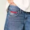 Tief sitzende Baggy-Jeans mit dunkel verwaschener amerikanischer Flaggengrafik Tief sitzende Baggy-Jeans mit dunkel verwaschener amerikanischer Flaggengrafik