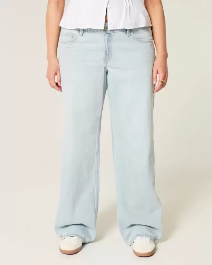 Tief sitzende Baggy-Jeans mit heller Waschung und Sternstickerei Tief sitzende Baggy-Jeans mit heller Waschung und Sternstickerei