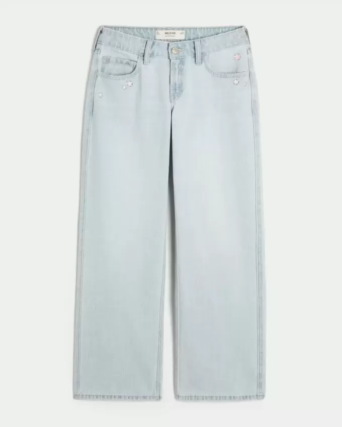 Tief sitzende Baggy-Jeans mit heller Waschung und Sternstickerei Tief sitzende Baggy-Jeans mit heller Waschung und Sternstickerei