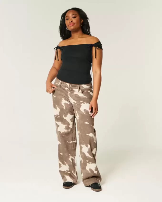 Tief sitzende Baggy-Jeans mit Kuh-Print Tief sitzende Baggy-Jeans mit Kuh-Print