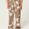 Tief sitzende Baggy-Jeans mit Kuh-Print Tief sitzende Baggy-Jeans mit Kuh-Print