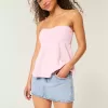 Tief sitzender Mini-Skort aus rosa besticktem Denim in heller Waschung