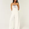 Trägerloser Jumpsuit aus Leinenmischung Trägerloser Jumpsuit aus Leinenmischung