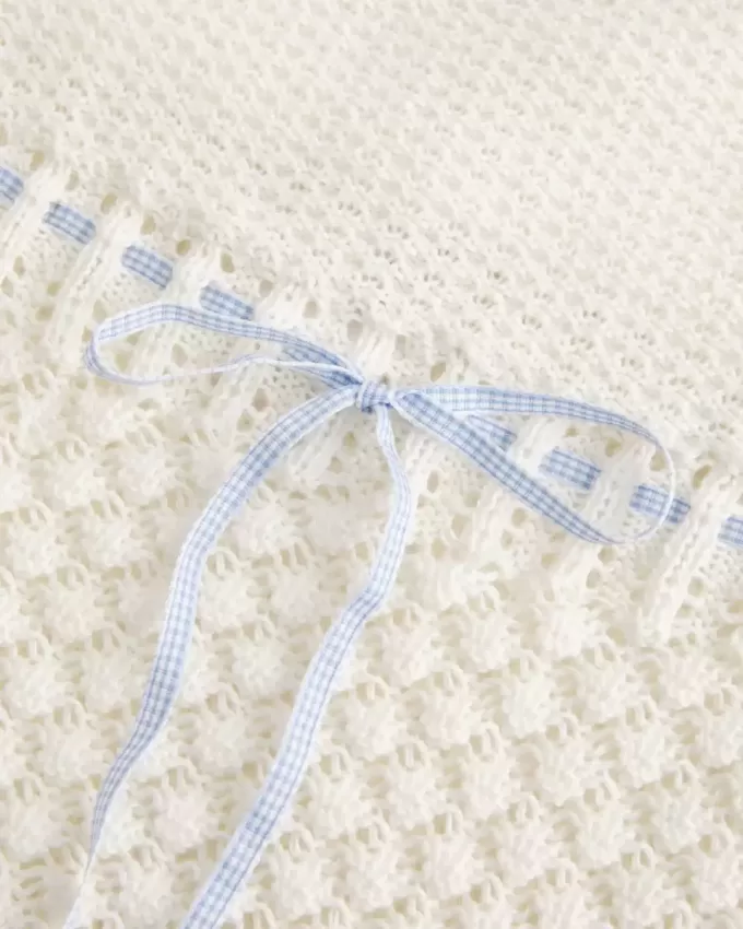 Trägerloses Pullover-Tube-Top im Häkel-Stil Trägerloses Pullover-Tube-Top im Häkel-Stil