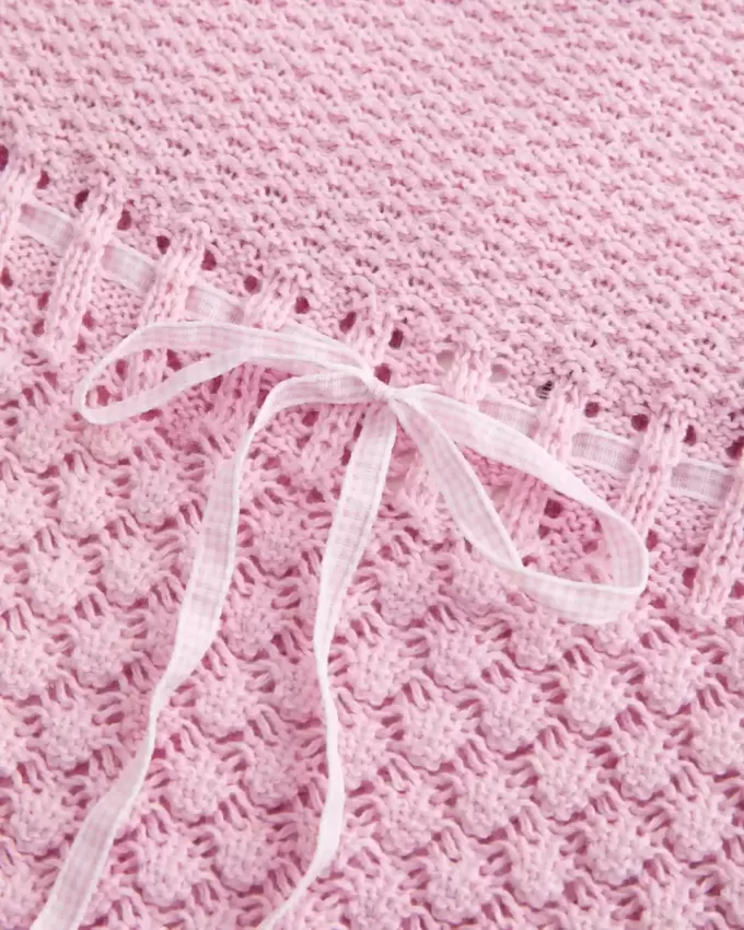 Trägerloses Pullover-Tube-Top im Häkel-Stil Trägerloses Pullover-Tube-Top im Häkel-Stil