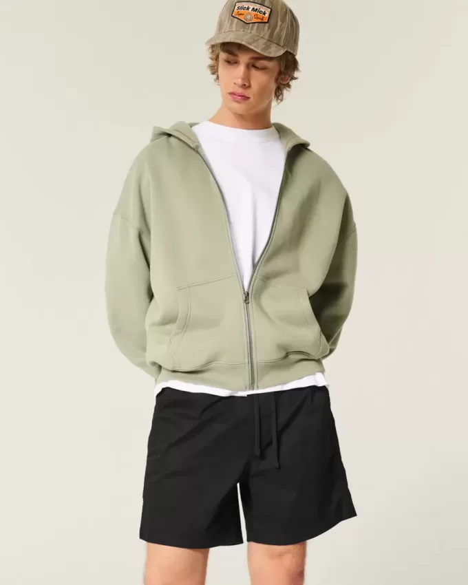 Twill-Shorts zum Überziehen bis zur Mitte des Oberschenkels Twill-Shorts zum Überziehen bis zur Mitte des Oberschenkels