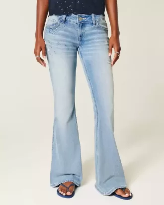 Ultra Low-Rise Distressed Light Wash Flare Jeans mit Pailletten