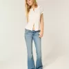 Ultra Low-Rise Flare Jeans mit mittlerer Waschung Ultra Low-Rise Flare Jeans mit mittlerer Waschung