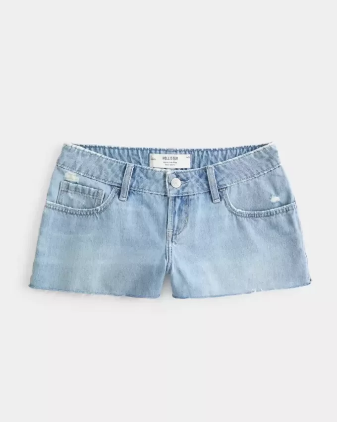 Ultra Low Rise Ripped Mini-Jeansshorts in mittlerer Waschung Ultra Low Rise Ripped Mini-Jeansshorts in mittlerer Waschung