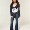 Ultra Low-Rise Schlagjeans in dunkler Waschung Ultra Low-Rise Schlagjeans in dunkler Waschung
