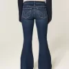 Ultra Low-Rise Schlagjeans in dunkler Waschung Ultra Low-Rise Schlagjeans in dunkler Waschung