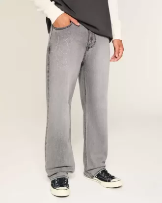 Verwaschene schwarze Baggy-Jeans mit Grafik und Verzierung