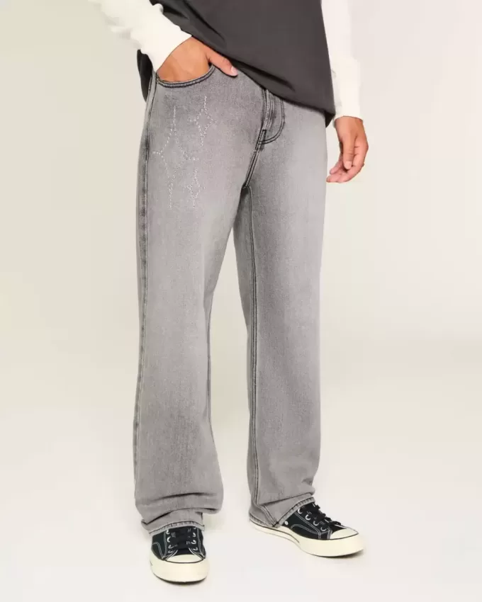 Verwaschene schwarze Baggy-Jeans mit Grafik und Verzierung Verwaschene schwarze Baggy-Jeans mit Grafik und Verzierung