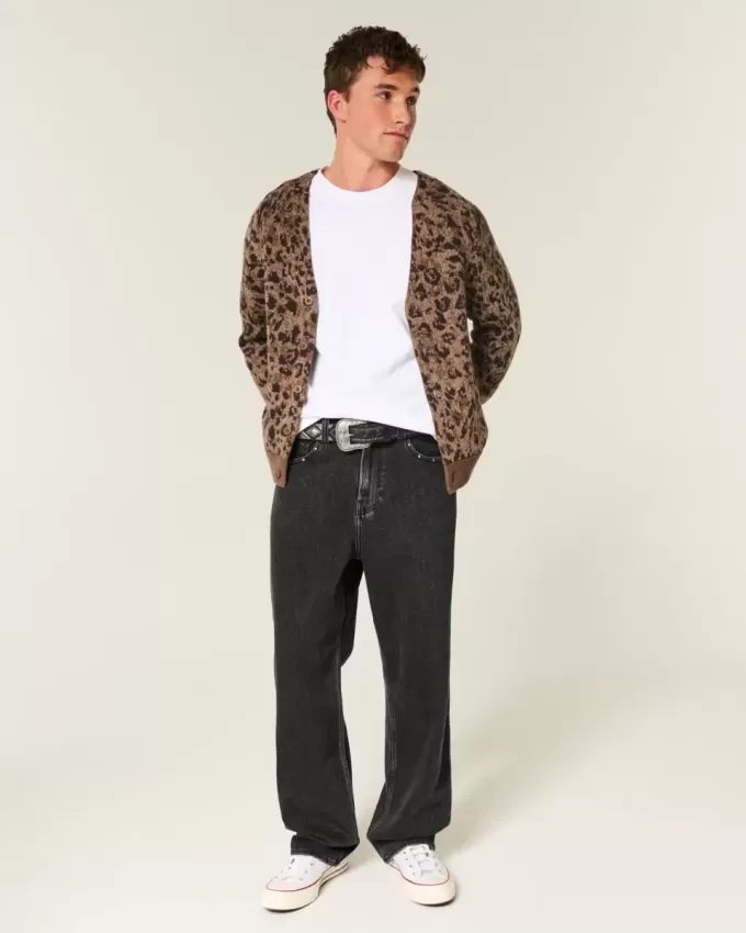 Verwaschene schwarze Baggy-Jeans mit Nieten Verwaschene schwarze Baggy-Jeans mit Nieten