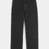 Verwaschene schwarze Baggy-Jeans mit Nieten Verwaschene schwarze Baggy-Jeans mit Nieten