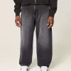 Verwaschene schwarze Skater-Baggy-Jeans mit Logo-Grafik Verwaschene schwarze Skater-Baggy-Jeans mit Logo-Grafik