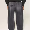 Verwaschene schwarze Skater-Baggy-Jeans mit Logo-Grafik Verwaschene schwarze Skater-Baggy-Jeans mit Logo-Grafik