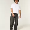 Verwaschene schwarze Skater-Baggy-Jeans mit Schlangenstickerei Verwaschene schwarze Skater-Baggy-Jeans mit Schlangenstickerei