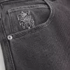 Verwaschene schwarze Skater-Baggy-Jeans mit Spielkarten-Joker-Grafik Verwaschene schwarze Skater-Baggy-Jeans mit Spielkarten-Joker-Grafik