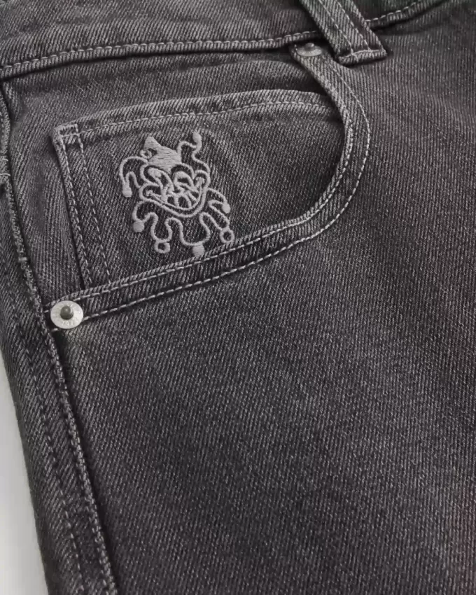 Verwaschene schwarze Skater-Baggy-Jeans mit Spielkarten-Joker-Grafik Verwaschene schwarze Skater-Baggy-Jeans mit Spielkarten-Joker-Grafik