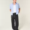 Verwaschene schwarze Super Baggy-Jeans mit Sterngrafik Verwaschene schwarze Super Baggy-Jeans mit Sterngrafik