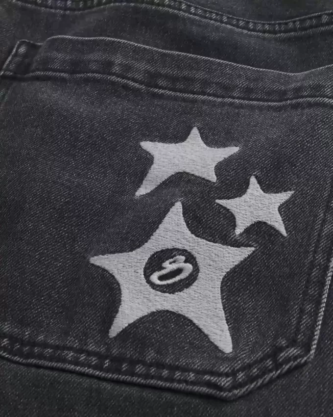 Verwaschene schwarze Super Baggy-Jeans mit Sterngrafik Verwaschene schwarze Super Baggy-Jeans mit Sterngrafik
