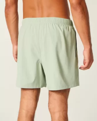 Volley-Badehose mit Stickerei bis zur Mitte des Oberschenkels Volley-Badehose mit Stickerei bis zur Mitte des Oberschenkels