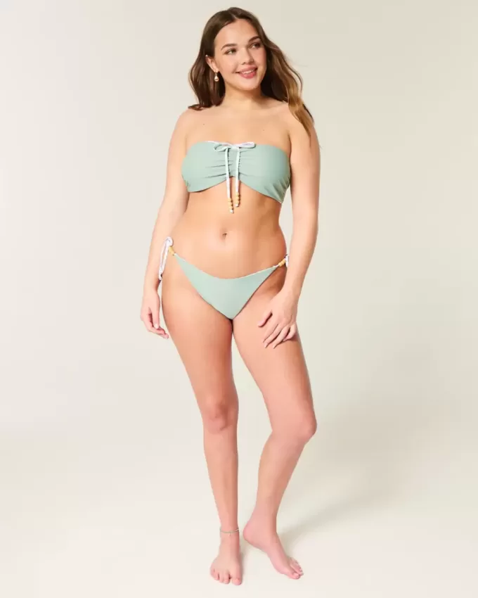 Wendbares, freches Bikinihöschen mit seitlicher Schnürung Wendbares, freches Bikinihöschen mit seitlicher Schnürung