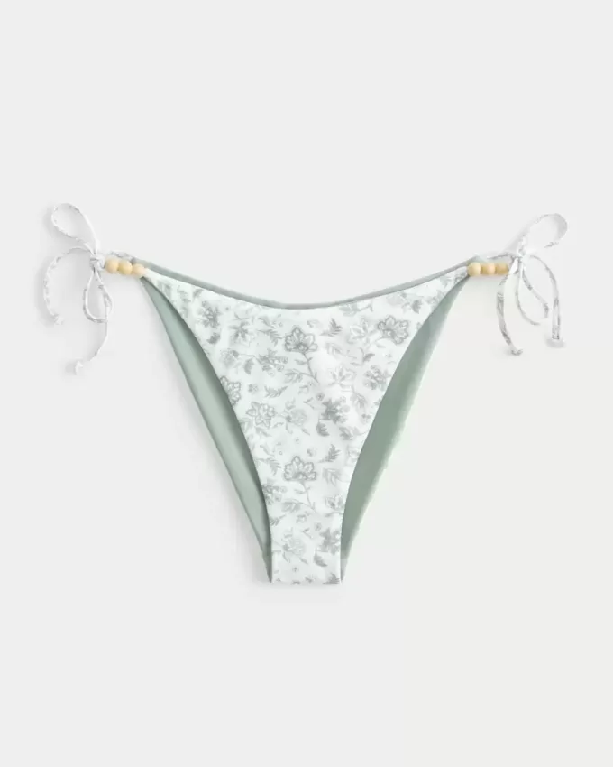 Wendbares, freches Bikinihöschen mit seitlicher Schnürung Wendbares, freches Bikinihöschen mit seitlicher Schnürung
