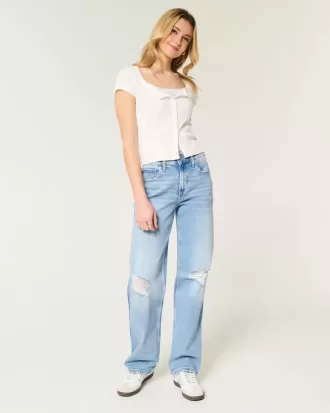 Zerrissene Dad-Jeans mit hohem Bund und mittlerer Waschung Zerrissene Dad-Jeans mit hohem Bund und mittlerer Waschung