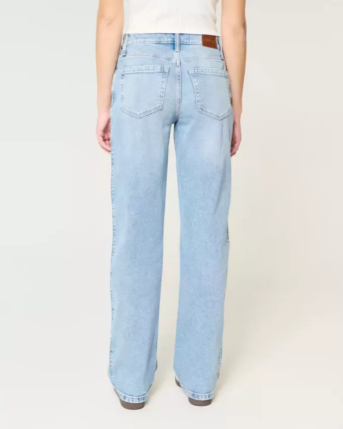 Zerrissene Dad-Jeans mit hohem Bund und mittlerer Waschung Zerrissene Dad-Jeans mit hohem Bund und mittlerer Waschung