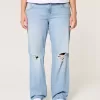 Zerrissene, lockere Straight-Jeans mit niedriger Taille und heller Waschung Zerrissene, lockere Straight-Jeans mit niedriger Taille und heller Waschung