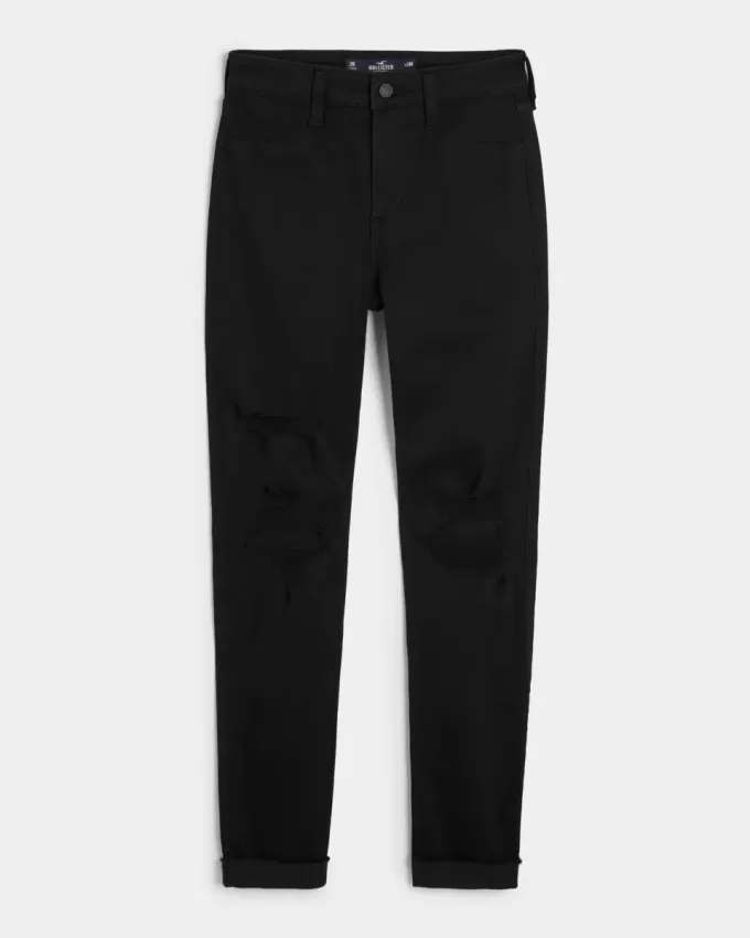 Zerrissene schwarze Jeans-Leggings mit hohem Bund Zerrissene schwarze Jeans-Leggings mit hohem Bund