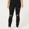 Zerrissene schwarze Super Skinny Jeans mit hohem Bund Zerrissene schwarze Super Skinny Jeans mit hohem Bund
