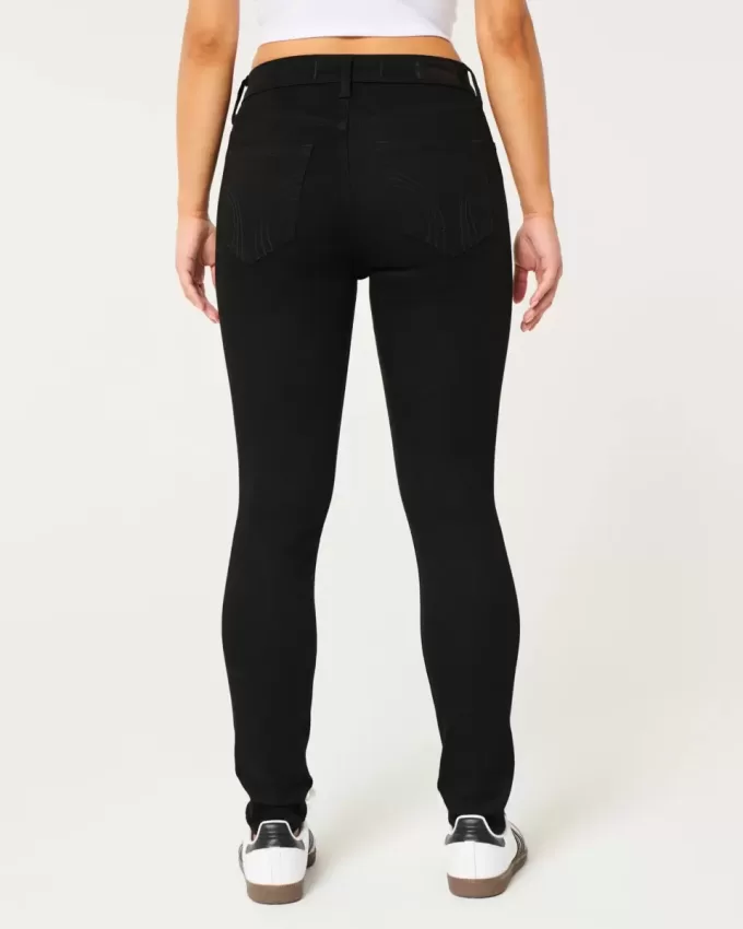 Zerrissene schwarze Super Skinny Jeans mit hohem Bund Zerrissene schwarze Super Skinny Jeans mit hohem Bund