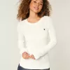 Zopfmuster-Strickpullover mit Sternenmuster und Rundhalsausschnitt Zopfmuster-Strickpullover mit Sternenmuster und Rundhalsausschnitt